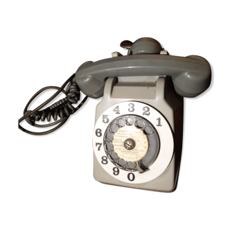 vintage telephone with rotating dial