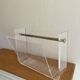 Vintage magazine rack in plexiglass by David Lange.