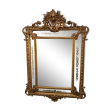 Mirror with parecloses