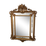 Mirror with parecloses