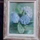 Old oil painting depicting a bouquet of flowers