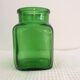 Bocal en verre vert vintage
