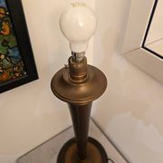 Vintage lamp base in Scandinavian style made of dark wood and bronze metal.