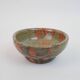 Small bowl in water green glazed ceramic with coral pink pattern