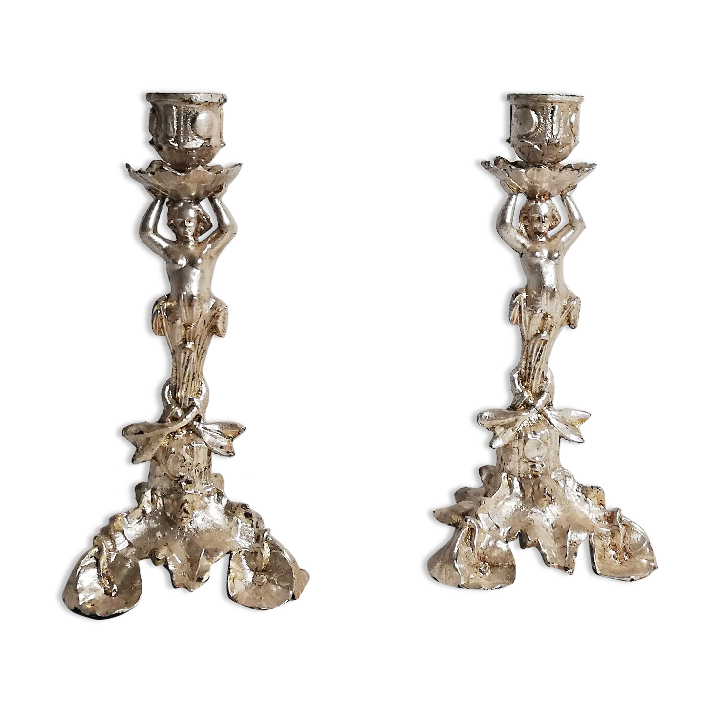 Pair of candlesticks restored to silver leaf
