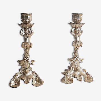 Pair of candlesticks restored to silver leaf