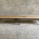 Vintage wood kindergarten bench and tubular structure in long