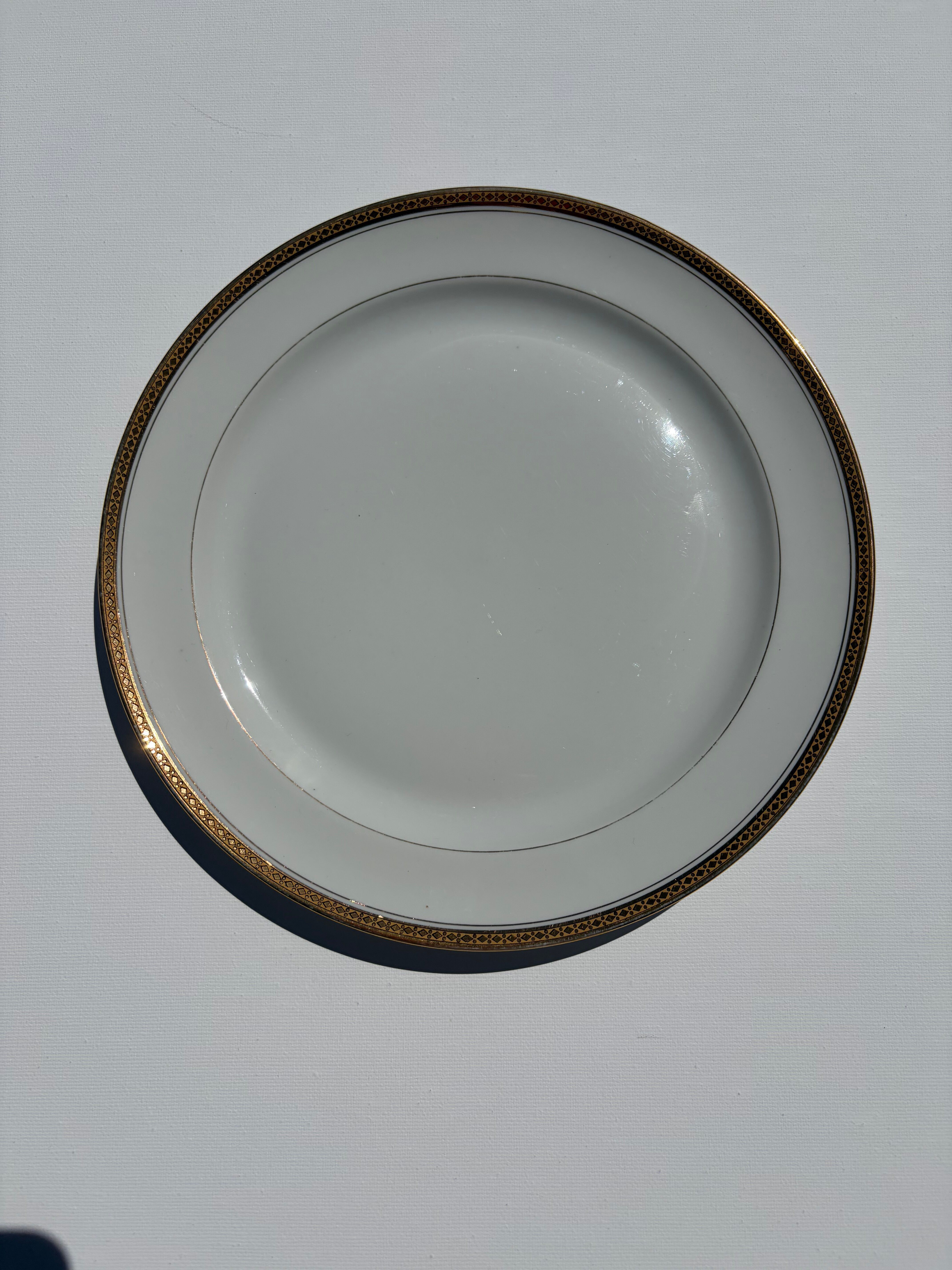 9 table plates made of Limoges porcelain