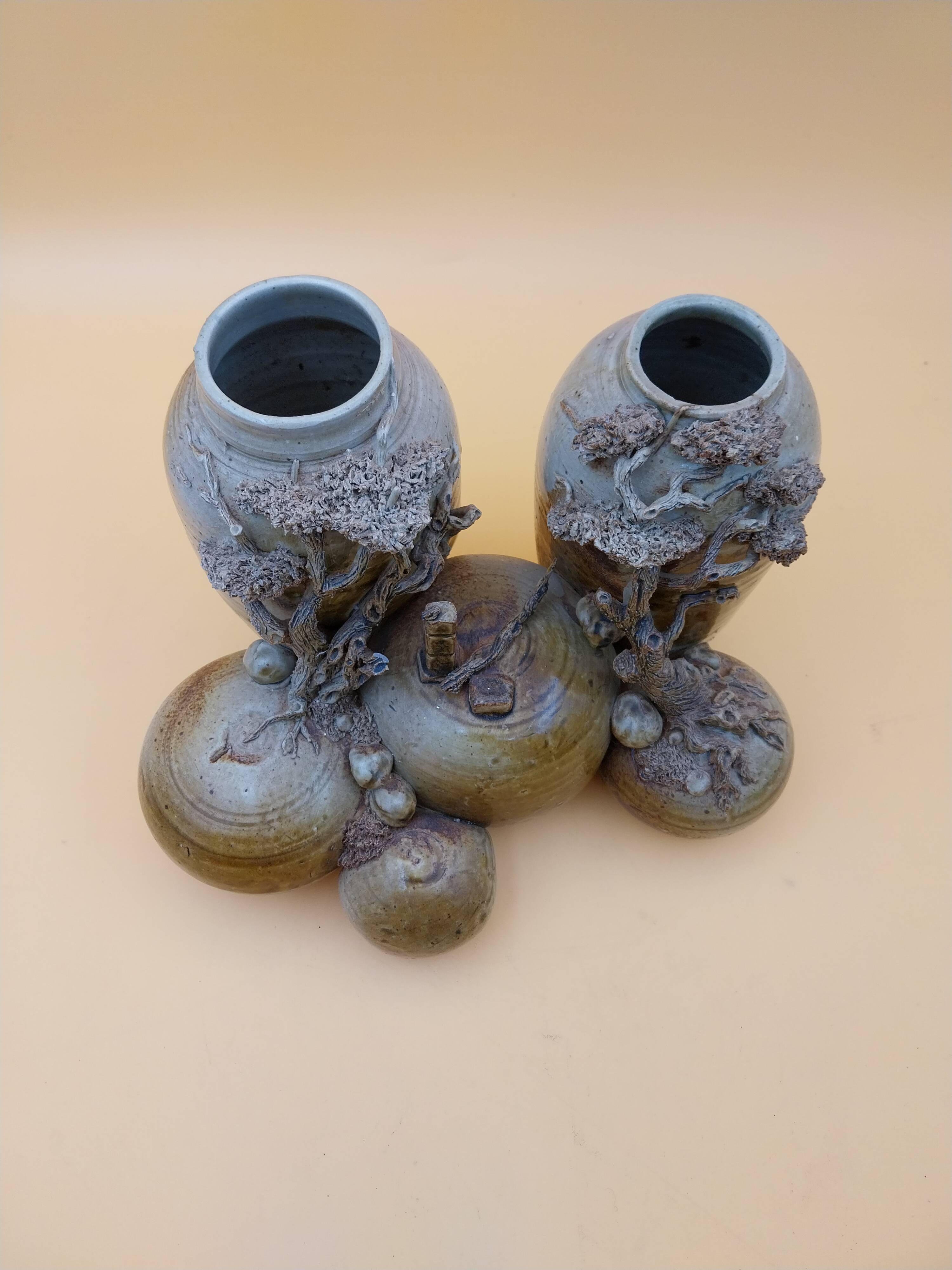 Vase en grès décor japonisant signé