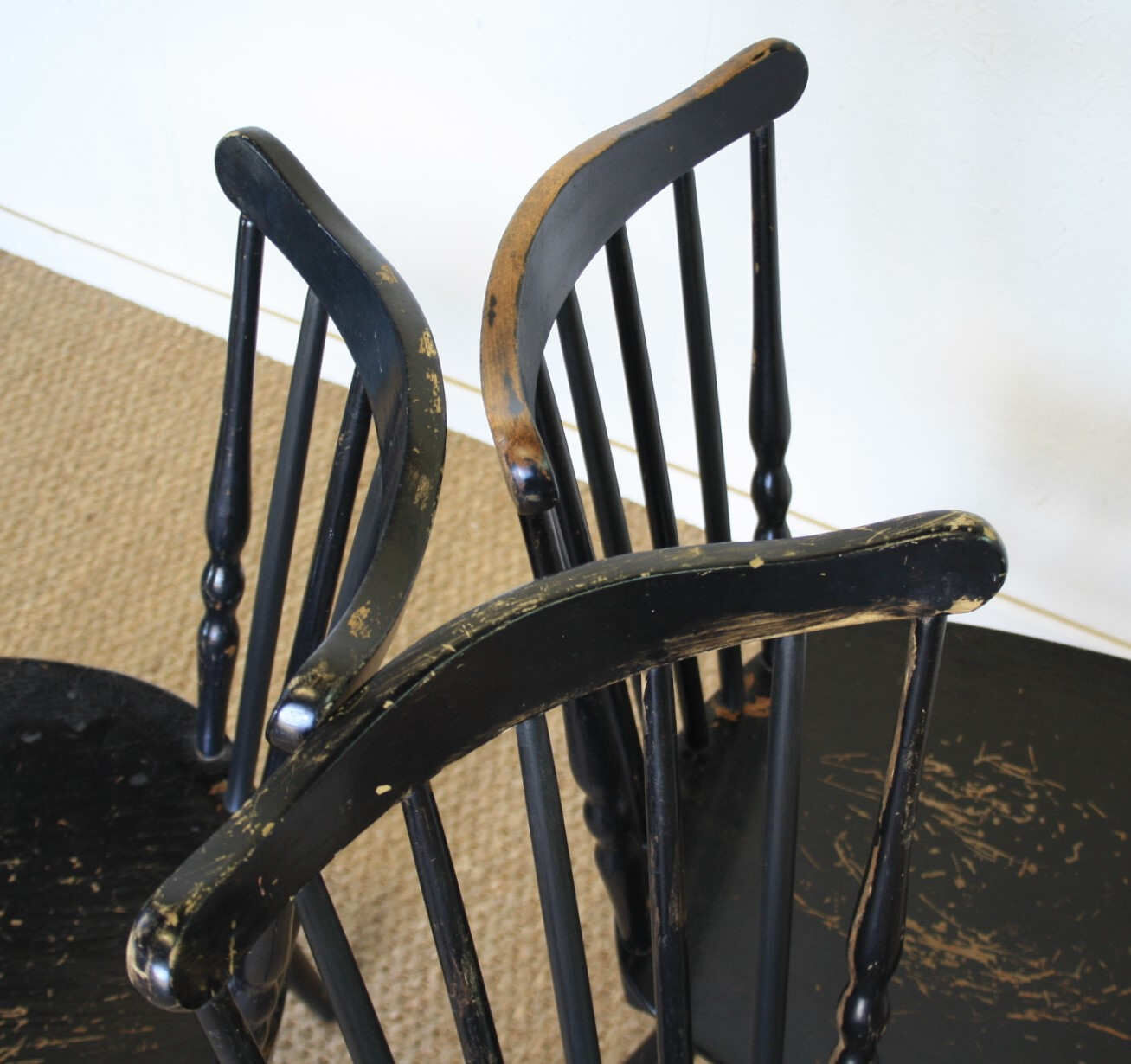 Three black Baumann bistro chairs