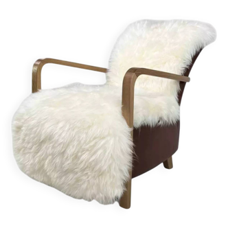 Fauteuil style scandinave en cuir et peau