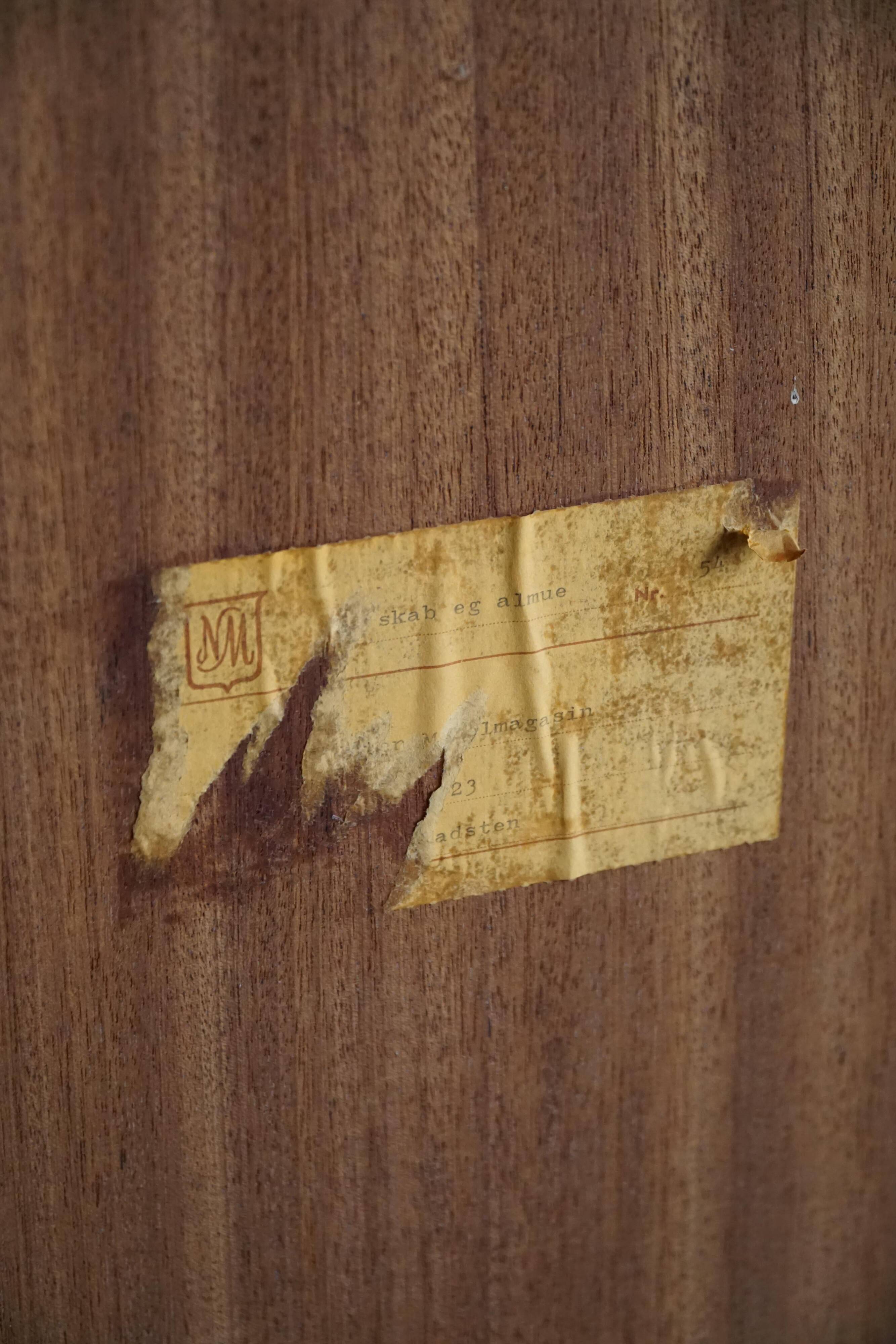 Henning Kjærnulf, enfilade in oak, mid-century Danish, Nyrup Møbelfabrik, 1960s.