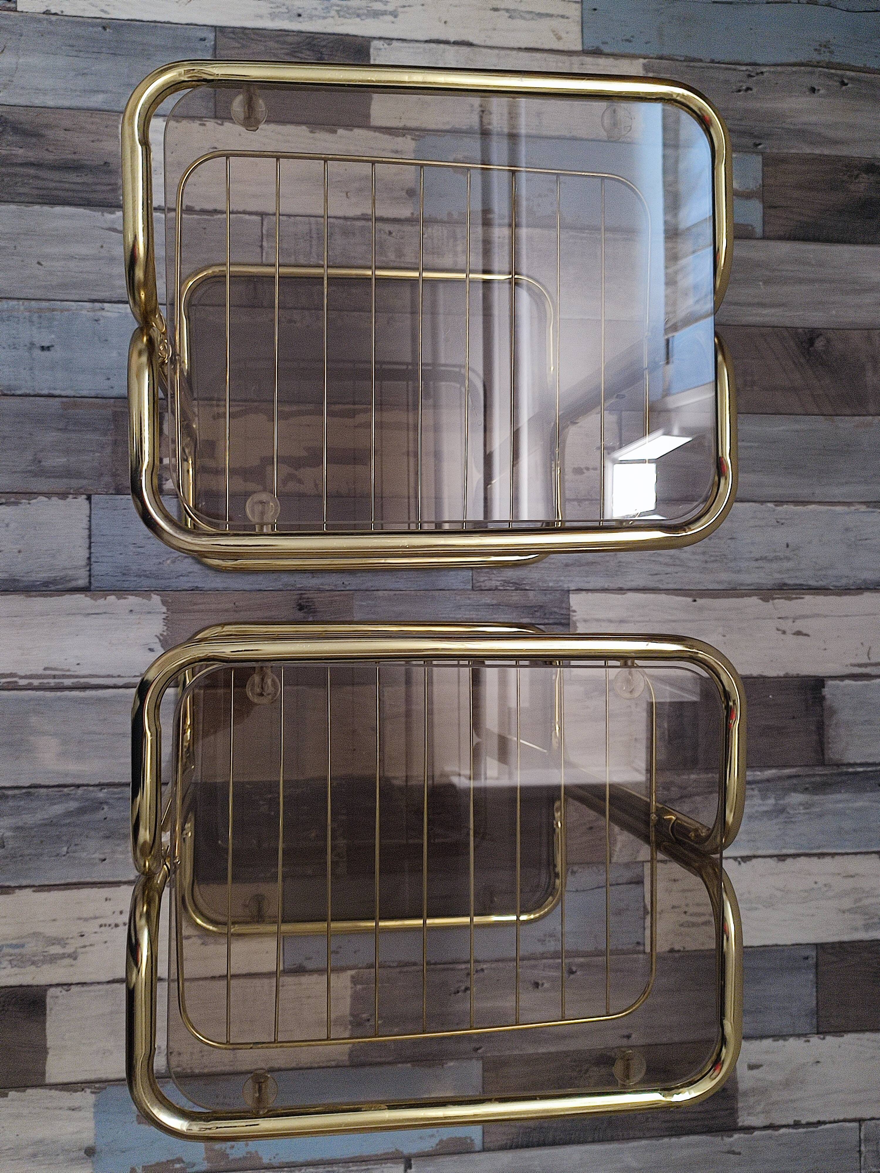 Pair of vintage smoked glass and brass bedside tables