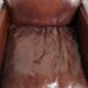 Dark cognac-coloured set of 2 sheepskin armchairs with a sleek design