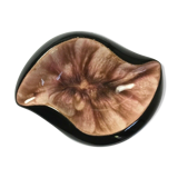Empty pocket or ceramic ashtray in the shape of a shell