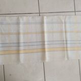 White tablecloth, yellow stripes in light linen.