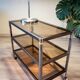 ERARD console (France), black metal and smoked glass side table, 1980.