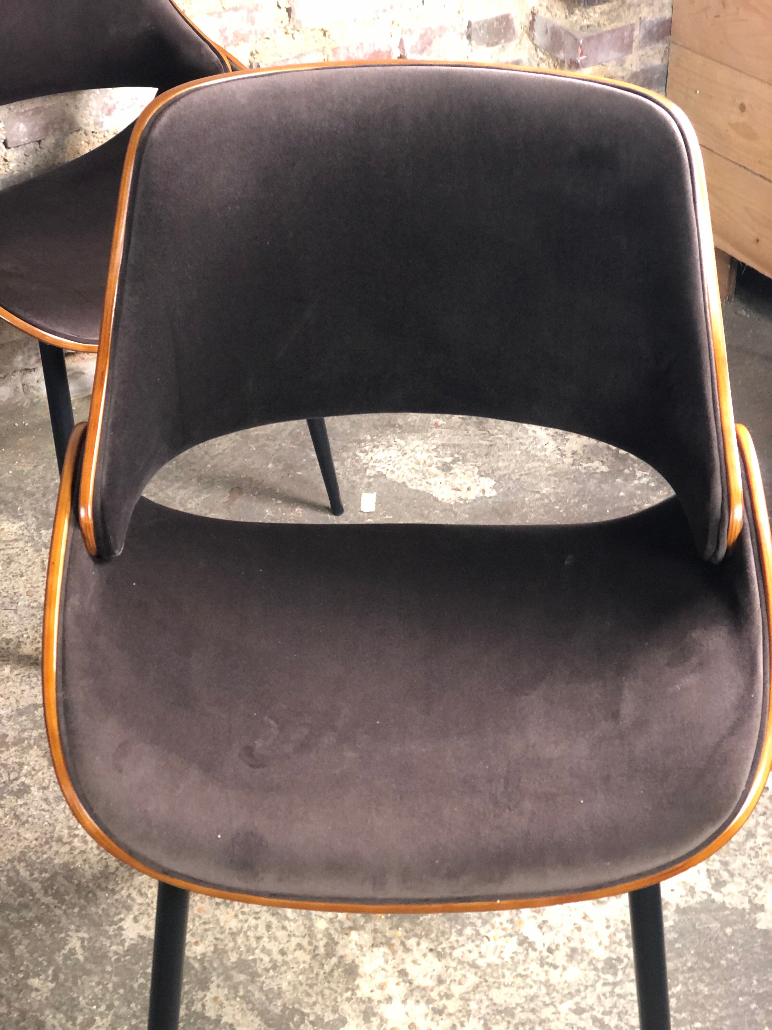 Scandinavian style chairs in curved plywood covered with brown fabric