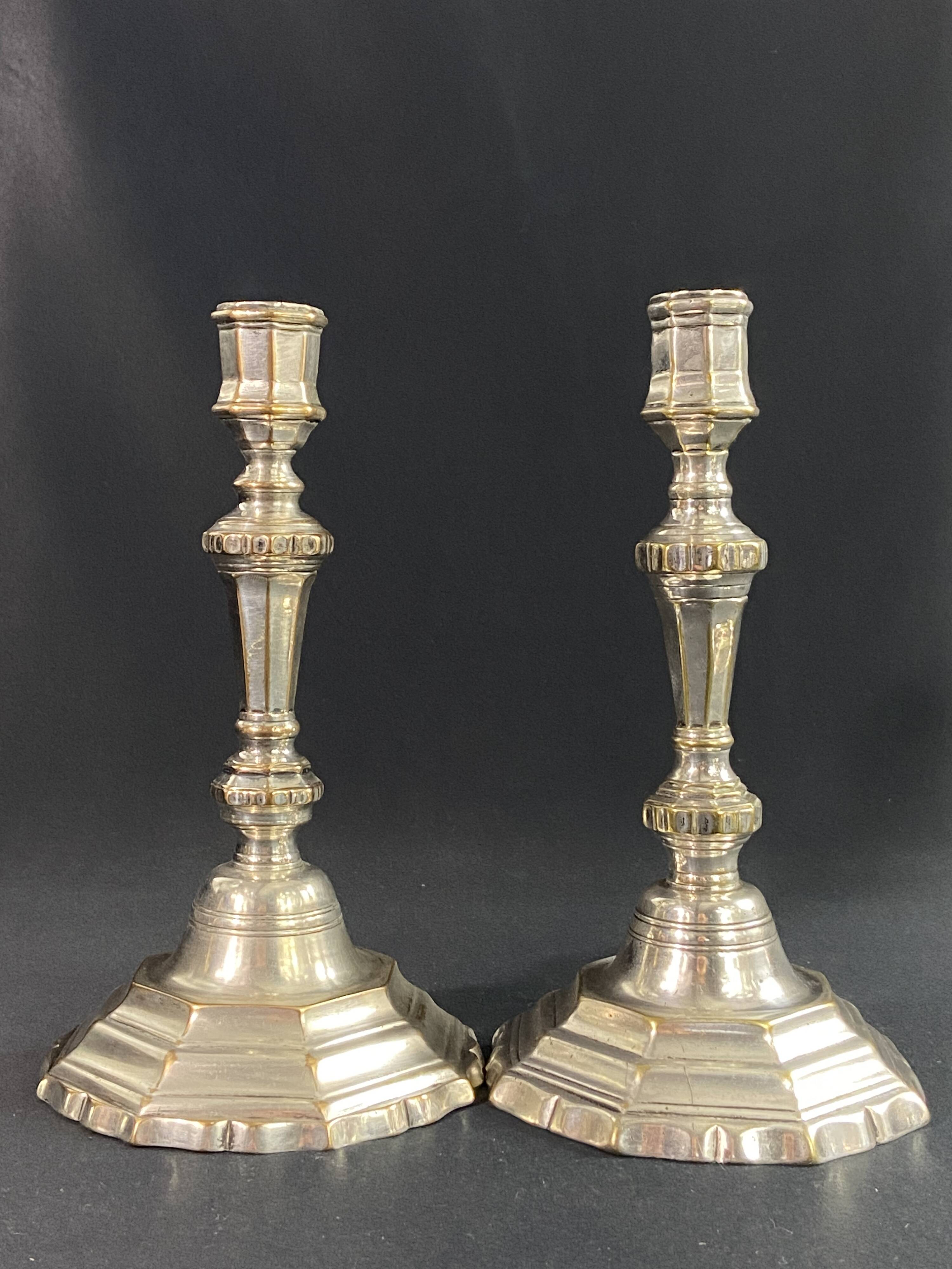 Pair of 18th century Regency candlesticks in silvered bronze