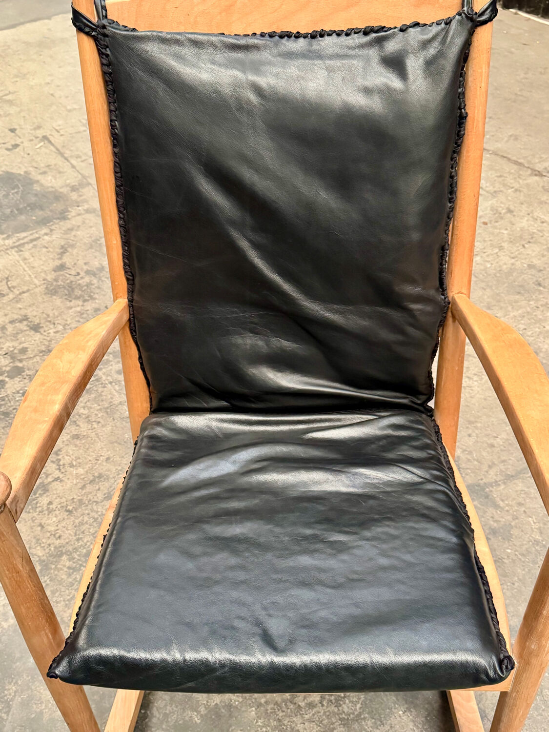 Scandinavian wooden and leather rocking chair