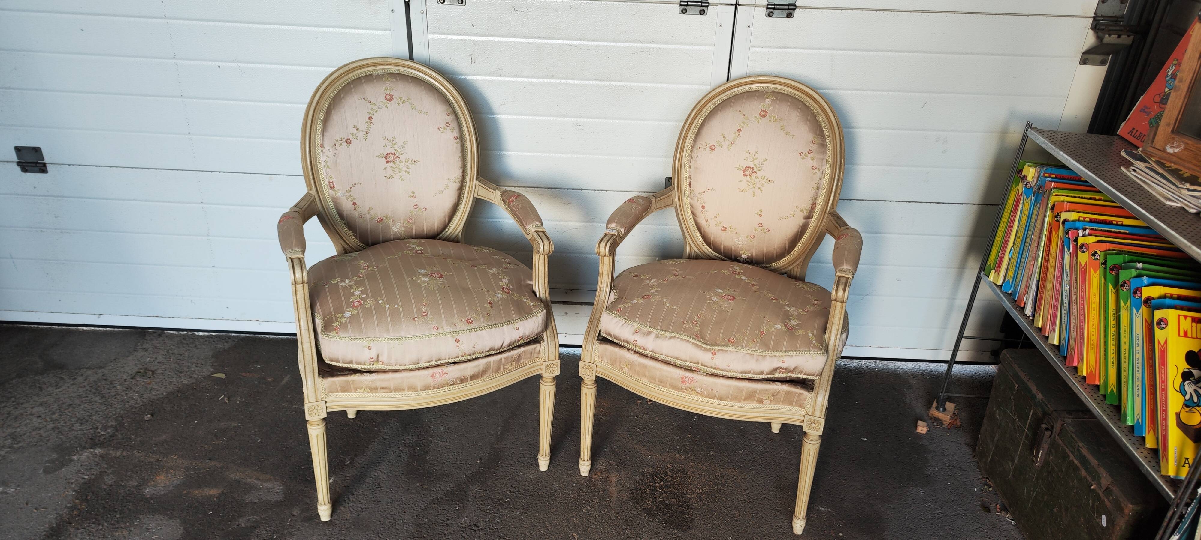 Old pair of Louis XVI style armchairs