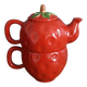 Teapot and cup in the shape of a strawberry.
