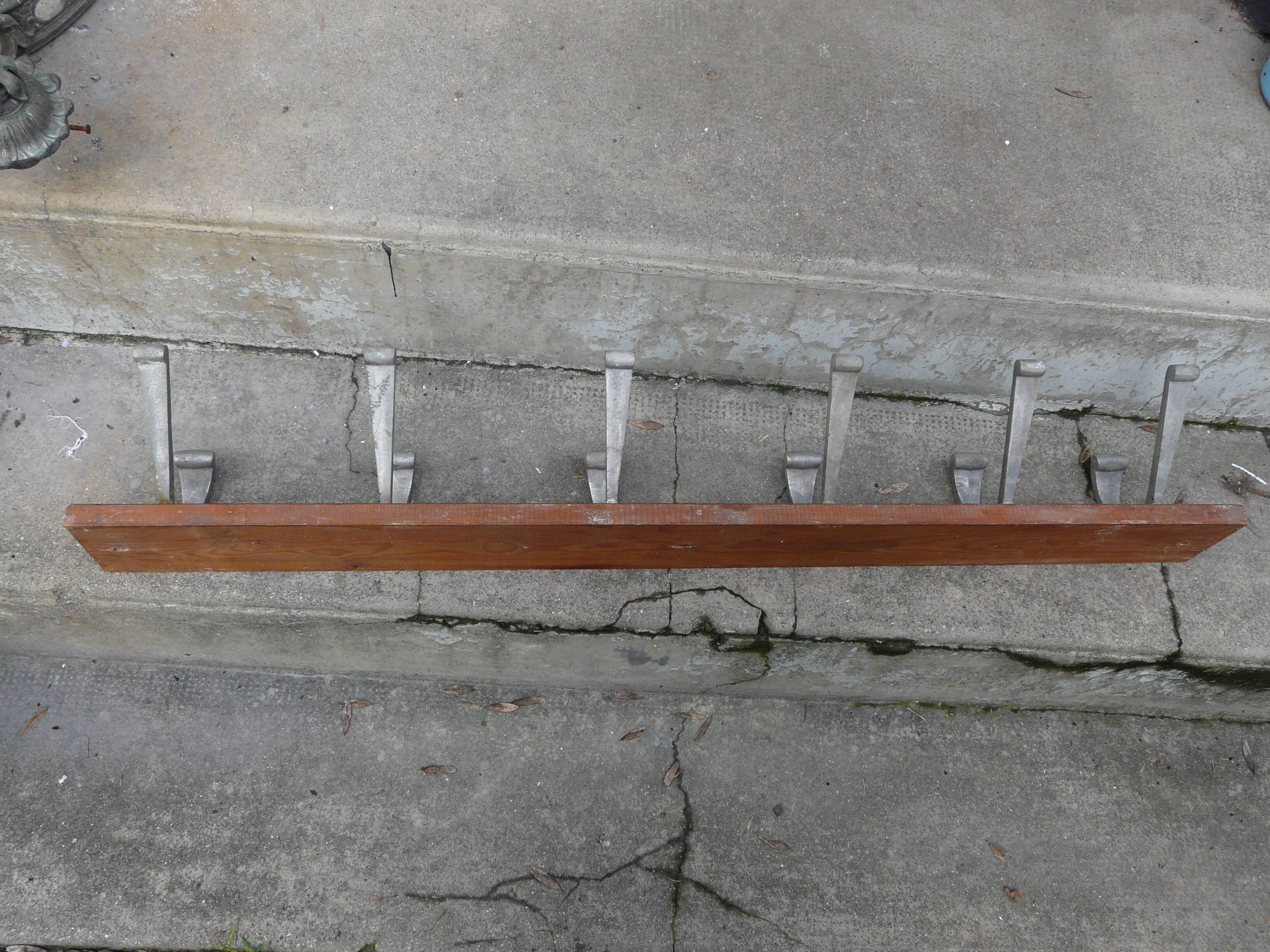 School wall coat rack with 6 double hooks in wood and aluminium.