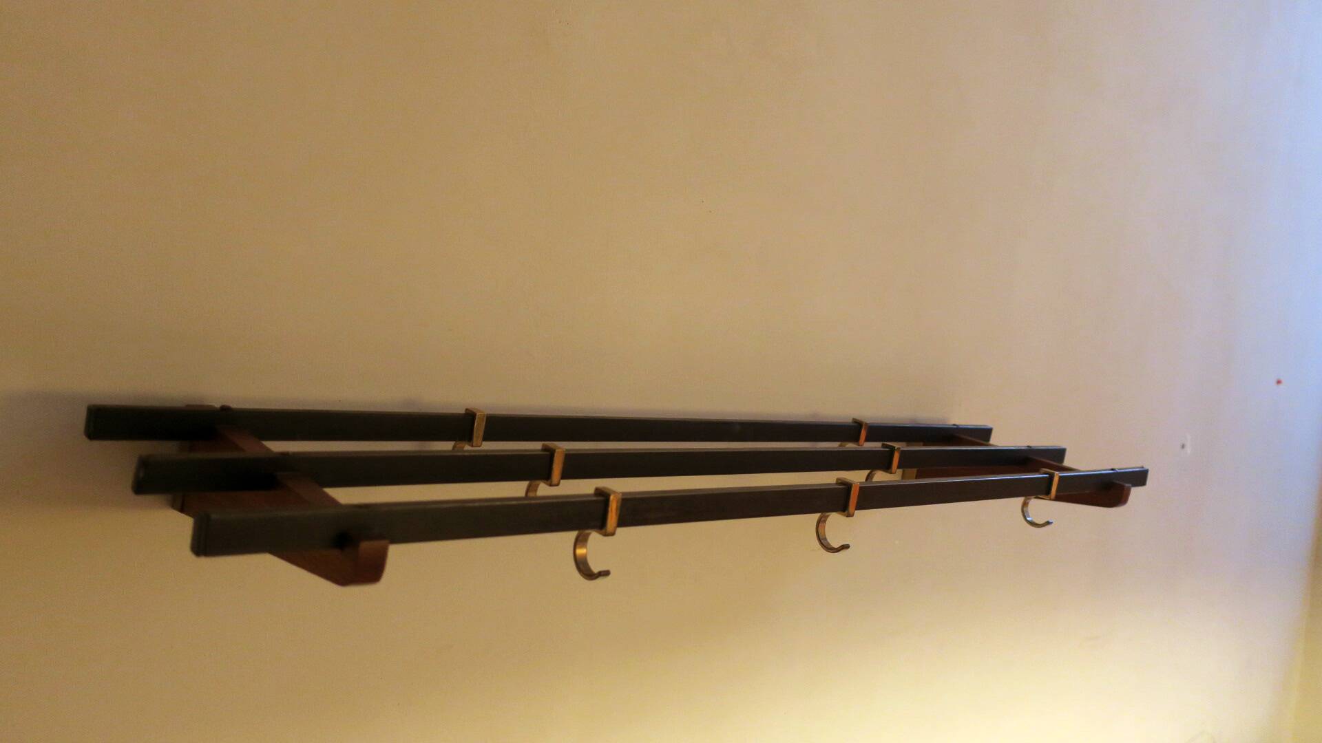 Teak, brass and black metal coat and hat rack, 1960s