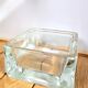Empty ashtray glass paved pocket