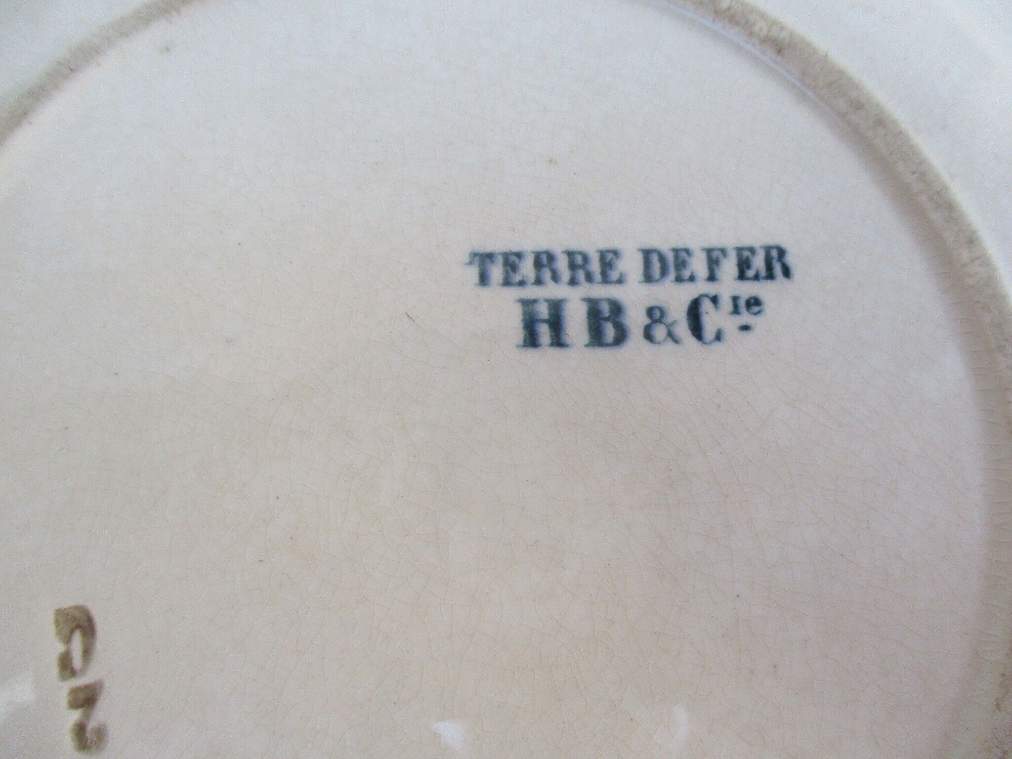 Iron earth H.B and Co. plate