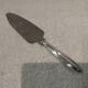 Christofle silver-plated metal cutting pie server with ribbons LXVI