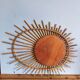 Asymmetrical sun mirror in rattan - vintage 1960s