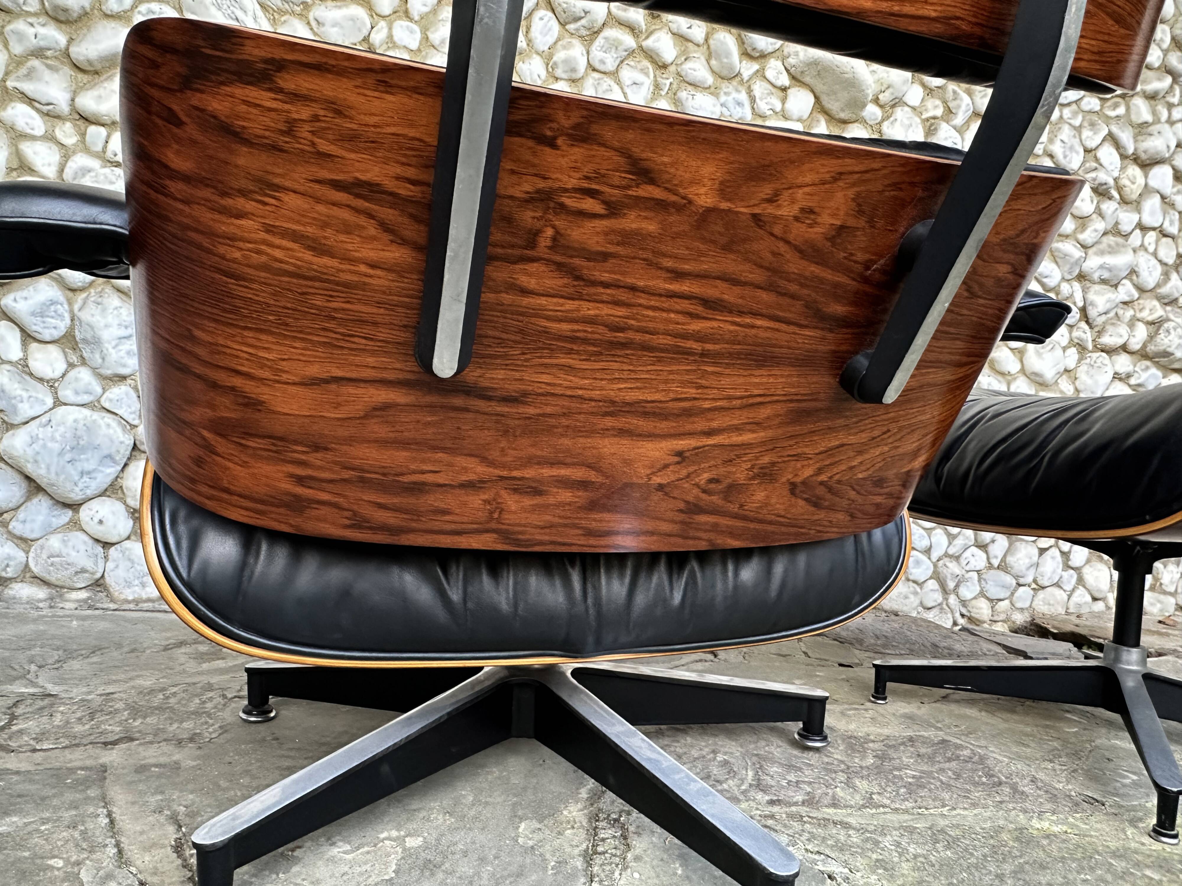 Fauteuil Lounge et ottoman Herman Miller Charles & Ray Eames, palissandre