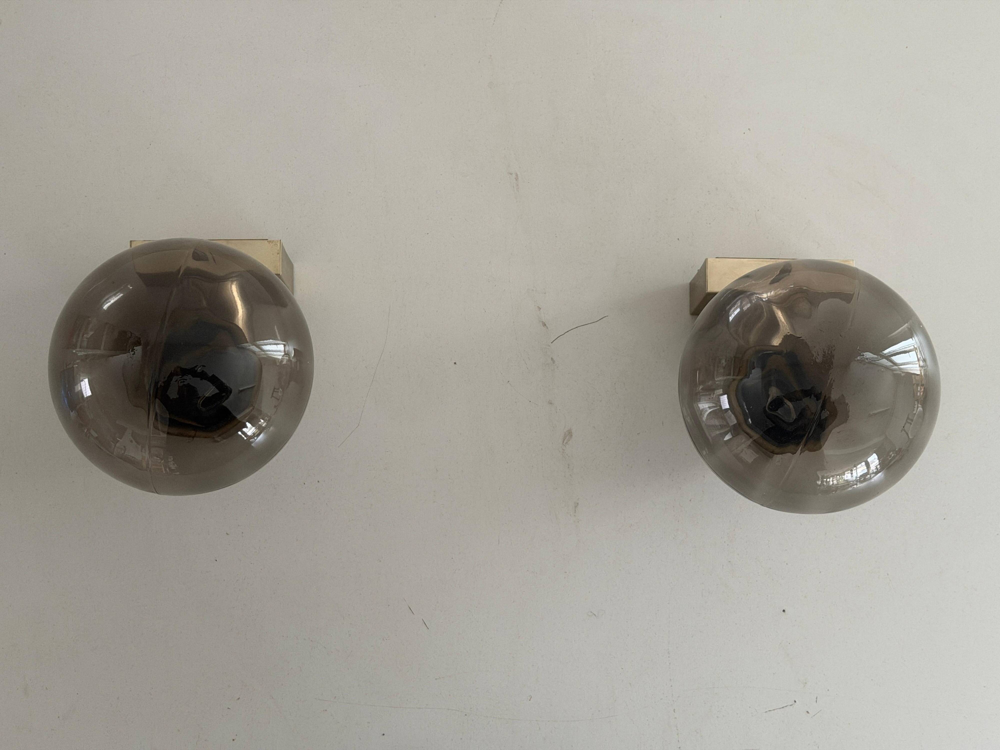 Pair of grey glass and chrome wall lights from the mid-century by N Leuchten, 1960s, Germany.