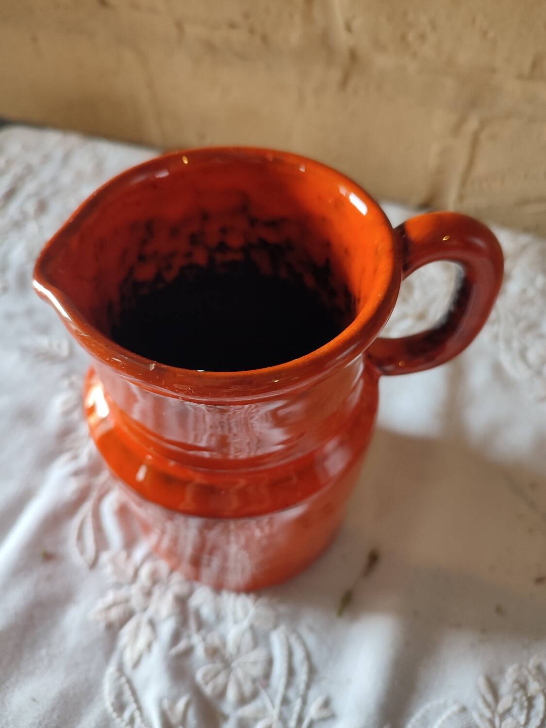 Pitcher vase in orange stoneware