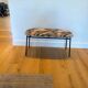 Calligaris bench in tropical patterned fabric