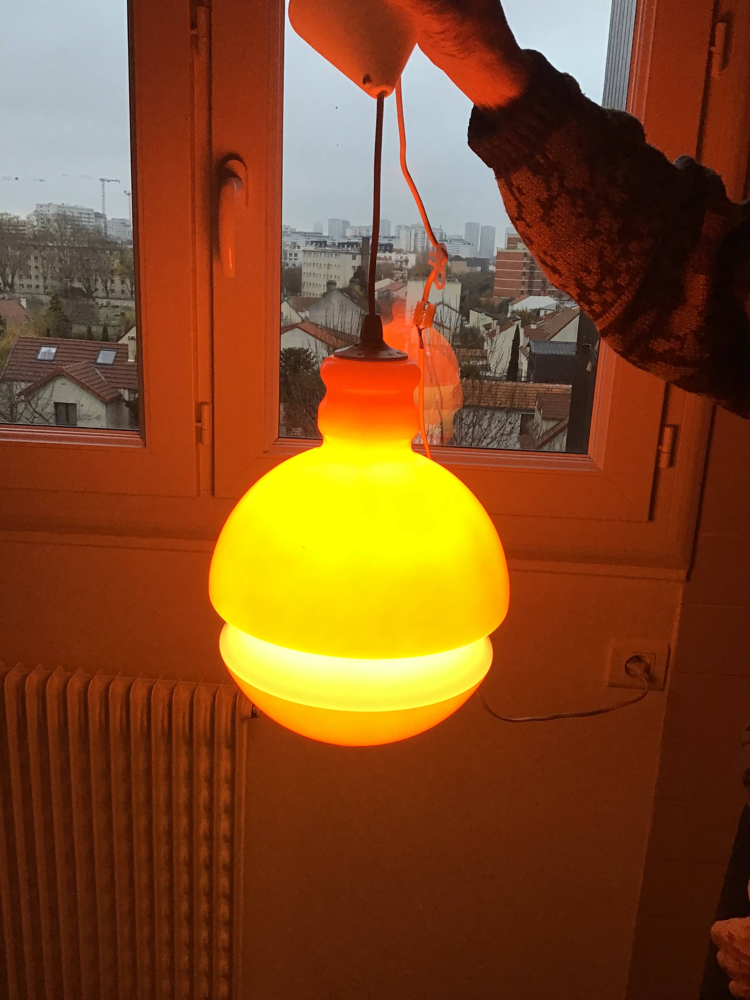 Globe pendant light in orange and white opaline glass, wiring in working order