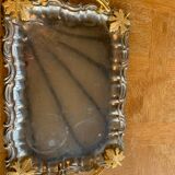 Silver metal top and decoration of foliage and handles in vintage brass