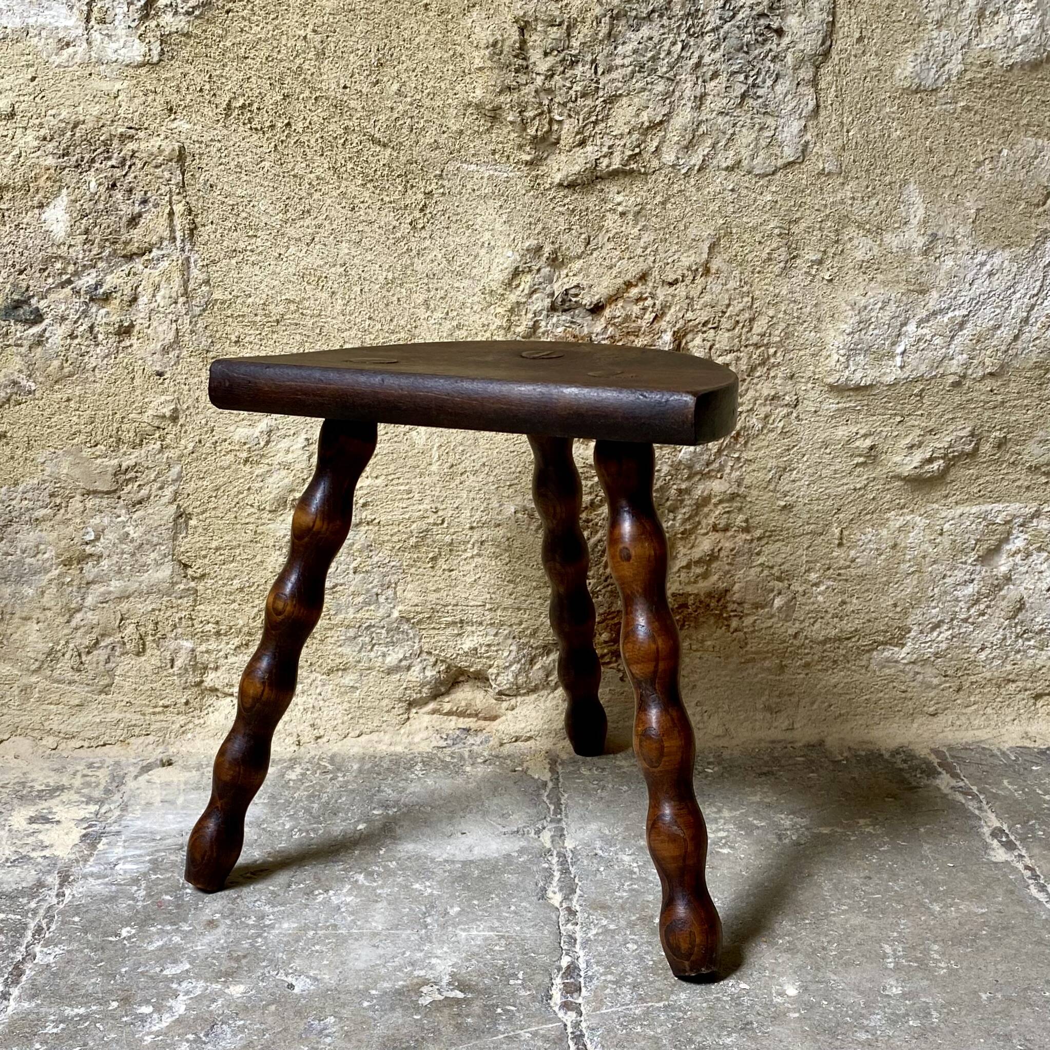 Turned wooden tripod stool