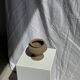 Small brutalist Indonesian footed pot H13 D15
