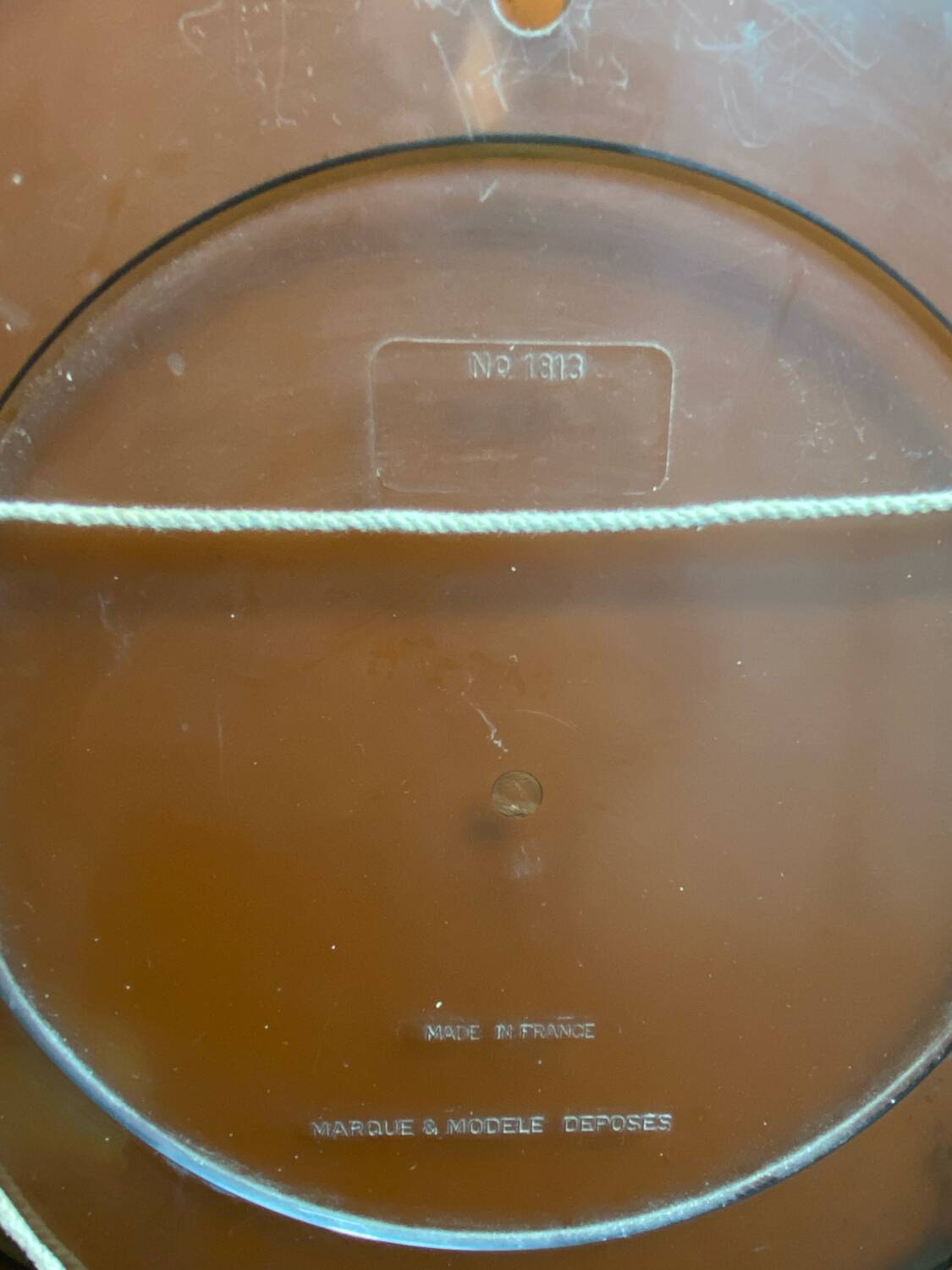 Circular mirror, smoked plastic, 1960s/70s.