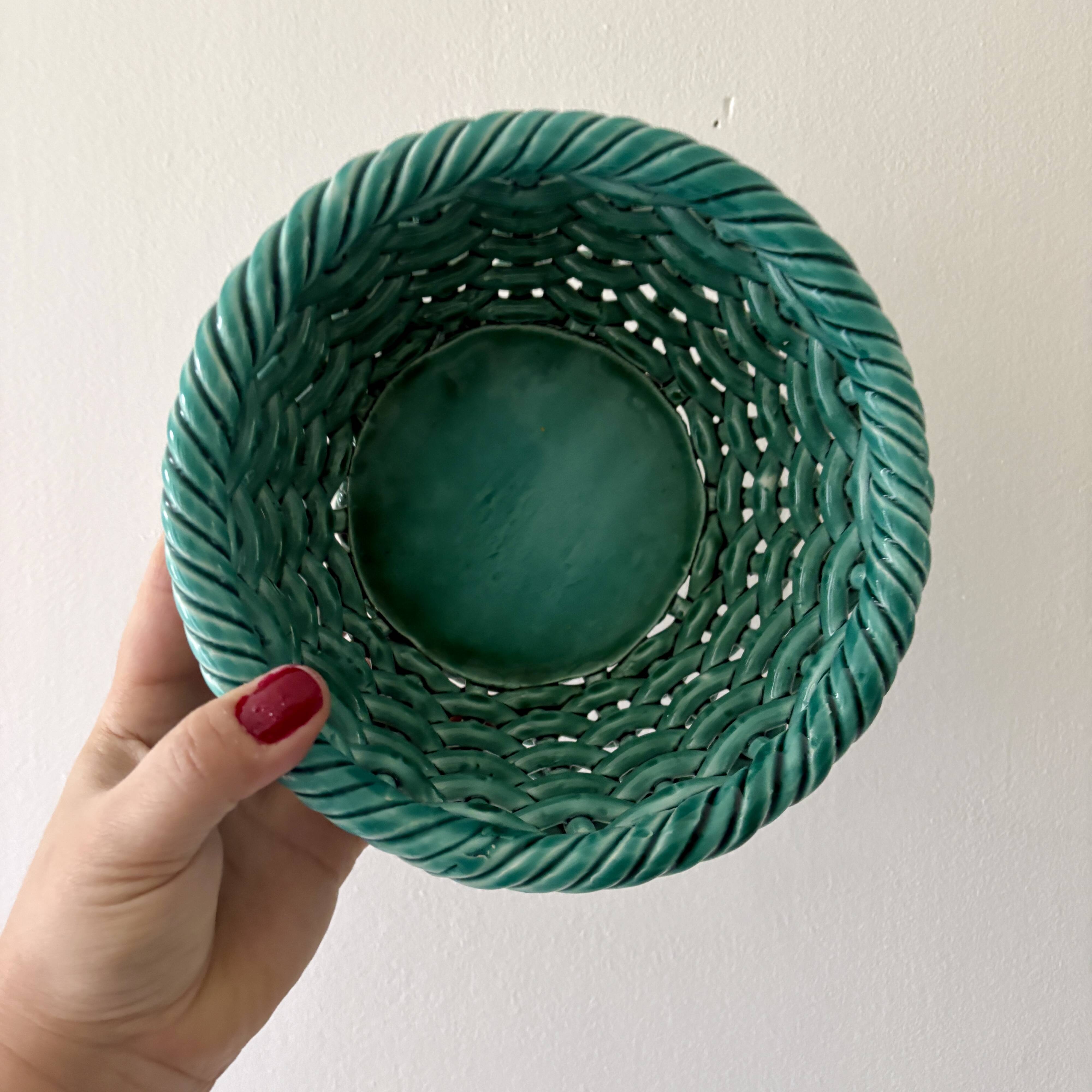 Vintage green earthenware plate/basket with fruit decorations.