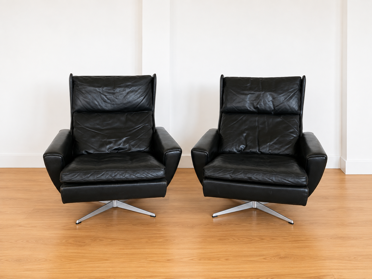 Vintage Danish Georg Thams matching black leather lounge chairs 1970s