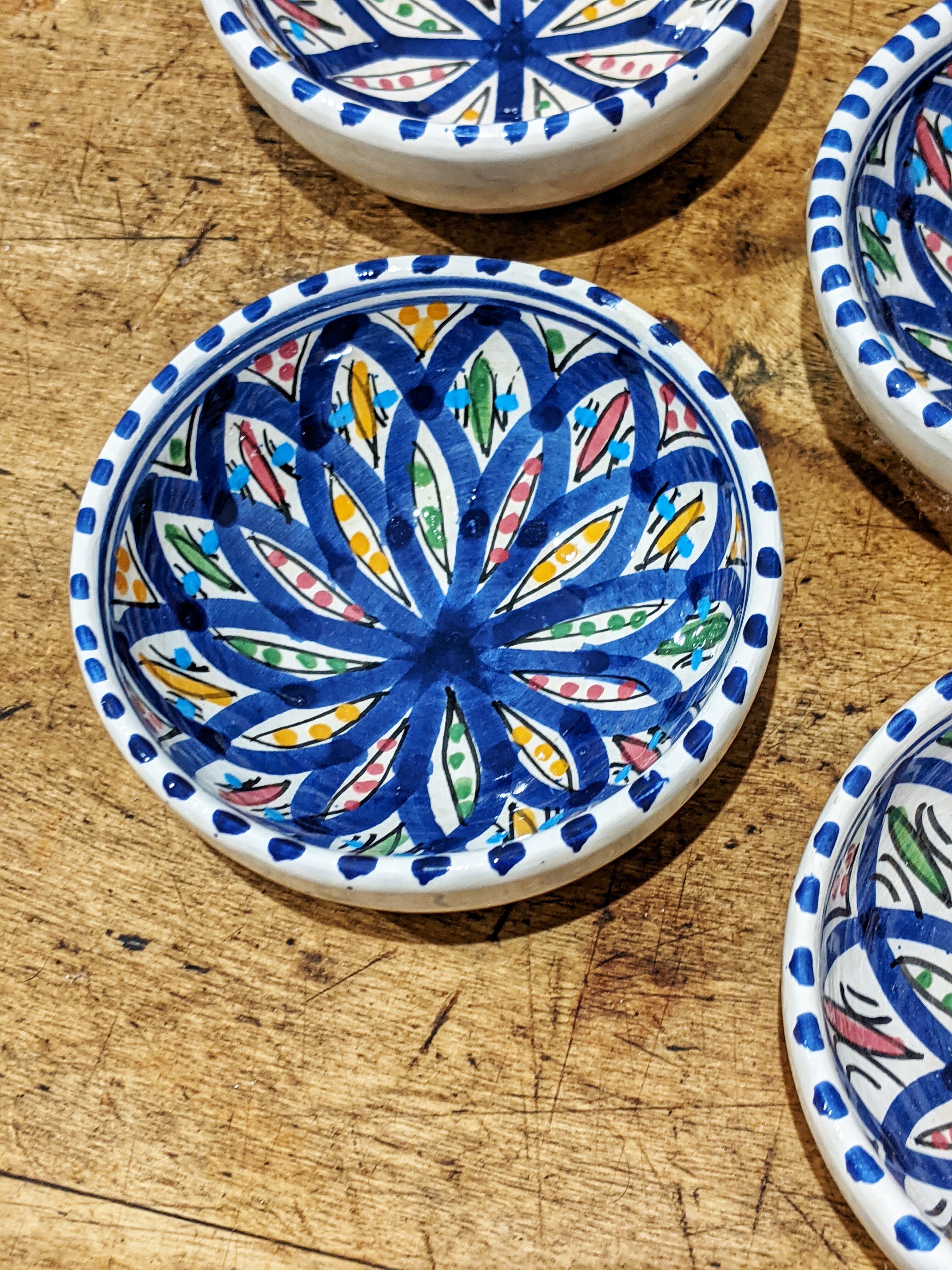 4 hand-painted ceramic cups