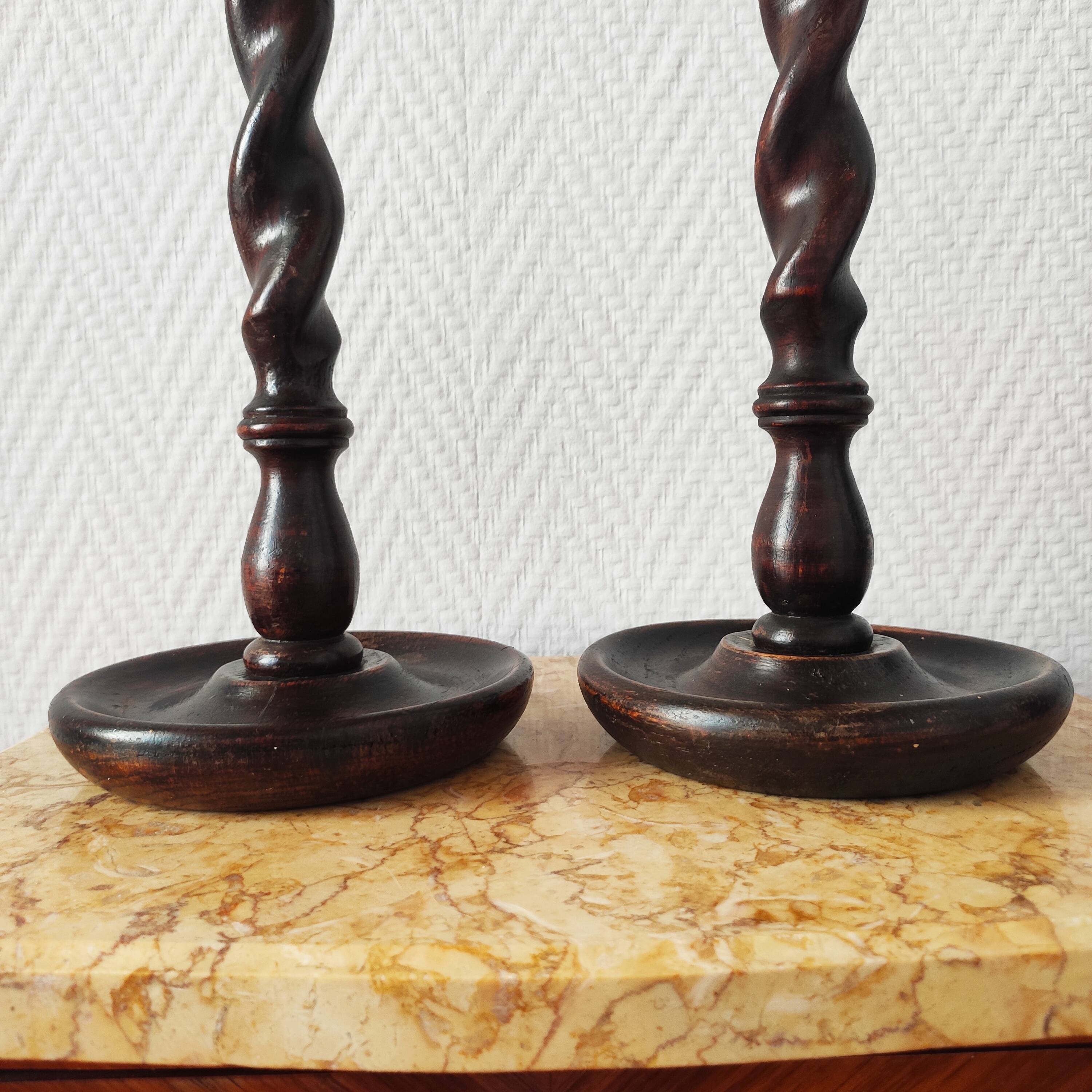 Old pair of English turned wood candlesticks