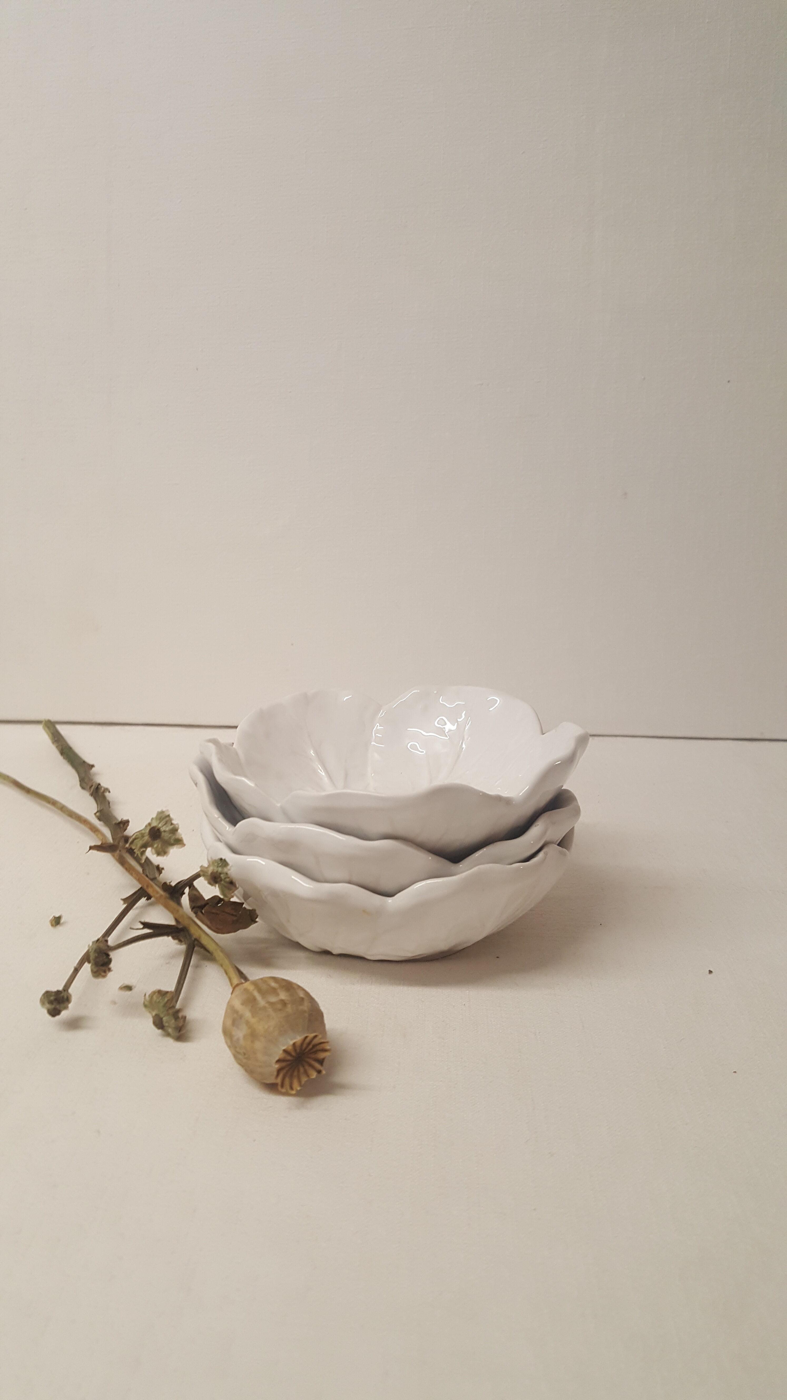 3 white ceramic flower cups