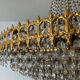 Chandelier cascade of tassels and brass