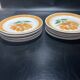 Set of twelve ceramic flat plates by Gien, Mougins decor