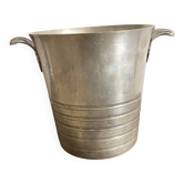 Antique champagne bucket with shell handles.