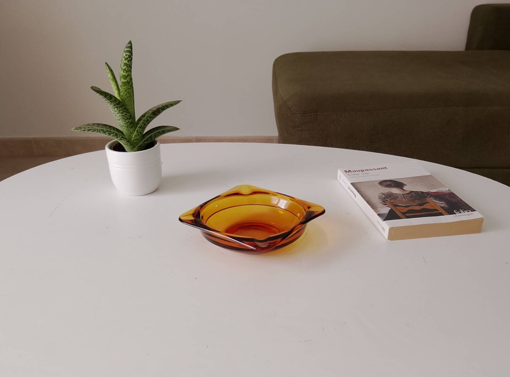 Vintage amber Duralex ashtray from the 1970s.